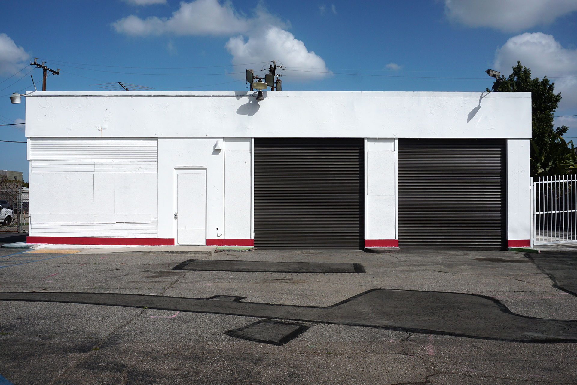 Industrial roll-up garage door being installed